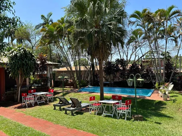 Jardín de El Guembe Hostel House en Puerto Iguazú