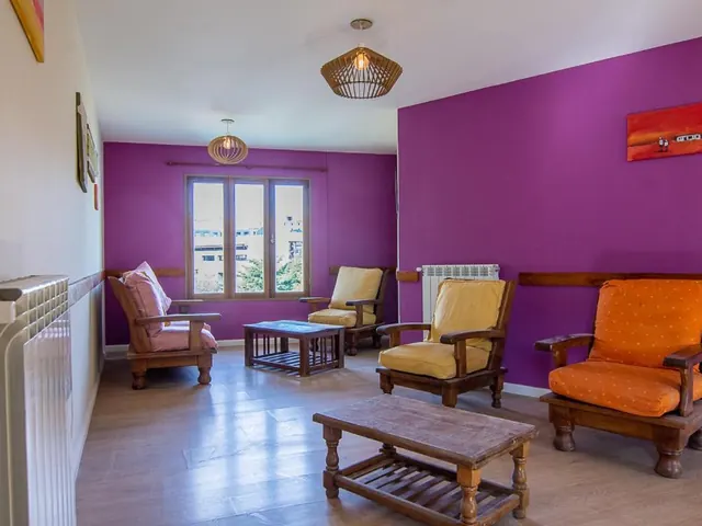Sala común de Hostel Pioneros del Valle en El Chaltén