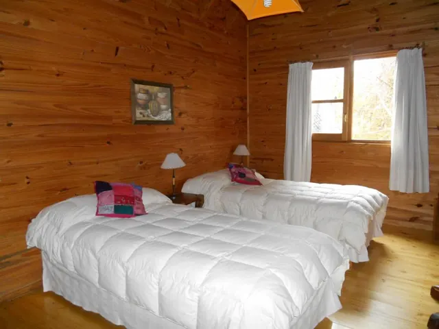 Quarto privativo de Hosteria Pichi Rincon em Villa La Angostura