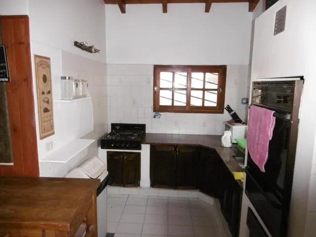 Cocina compartida de Hostel La Casa de Tounens en Puerto Madryn