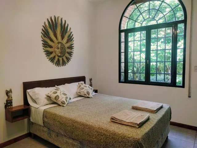 Quarto privativo de SOLES Hostel Boutique em Rosario