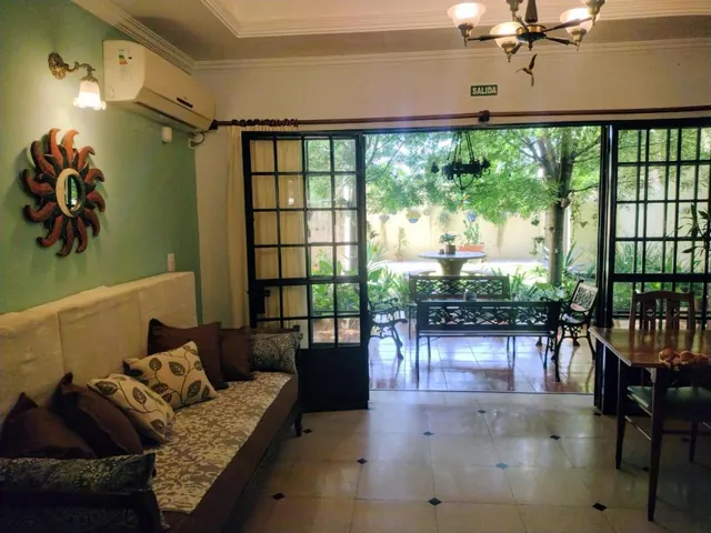 Sala de convivência de SOLES Hostel Boutique em Rosario